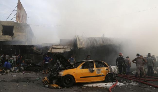 Bomb in Baghdad suburb kills at least 17  