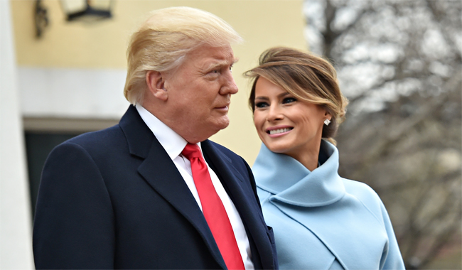 US President Donald Trump and his wife Melania leave St. John´s Episcopal Church before Trump´s inauguration