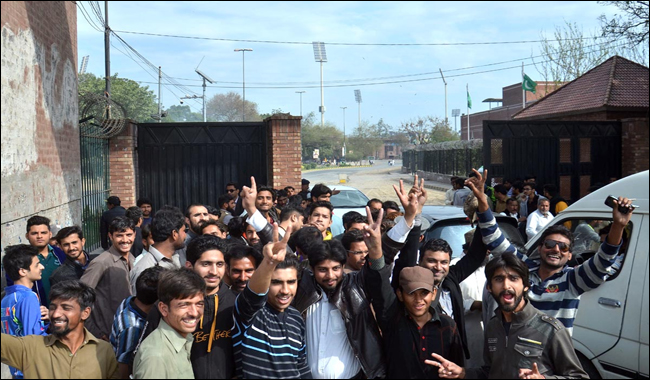 Cricket fans seen jubilant outside Gaddafi Stadium