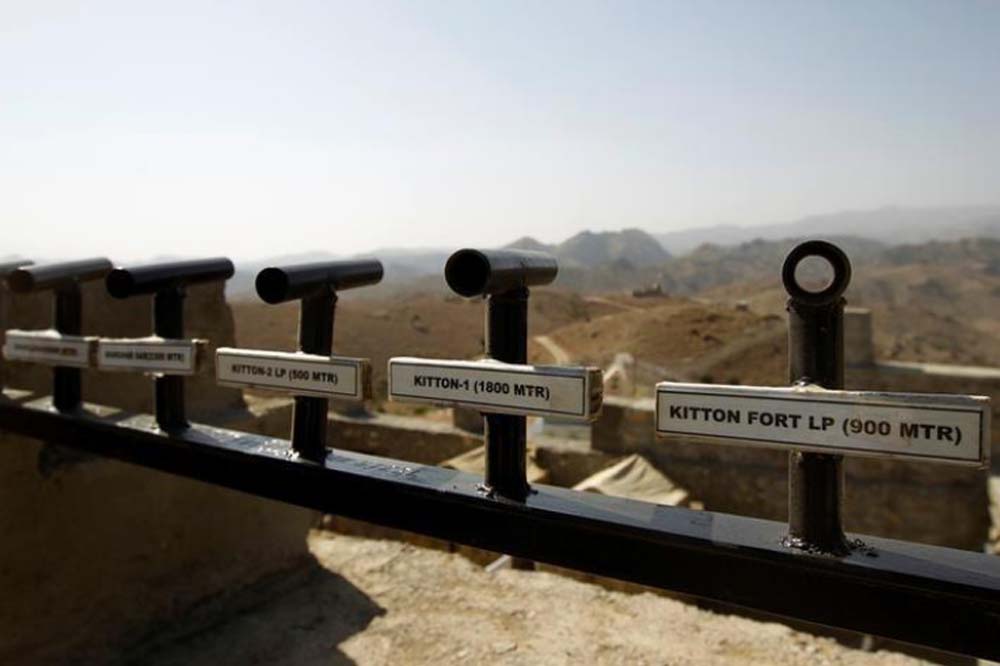 Location and range information is seen on a wall in the Kitton outpost along the border fence on the border with Afghanistan in North Waziristan, Pakistan October 18, 2017. 