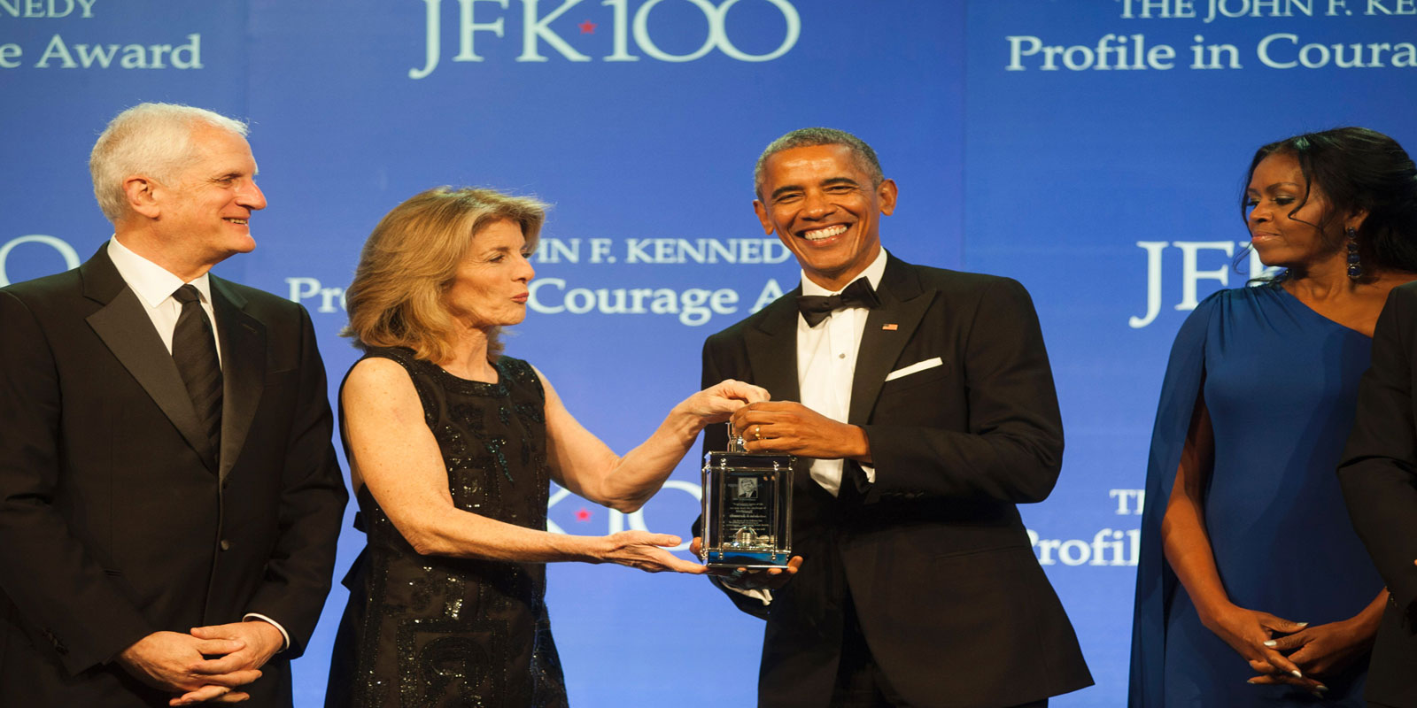 Former president Barack Obama receives the 2017 John F. Kennedy Profile in Courage Award from Caroline Kennedy Schlossberg (2nd-L) on May 7, 2017 at the JFK Library in Boston, Massachusetts. (AFP)