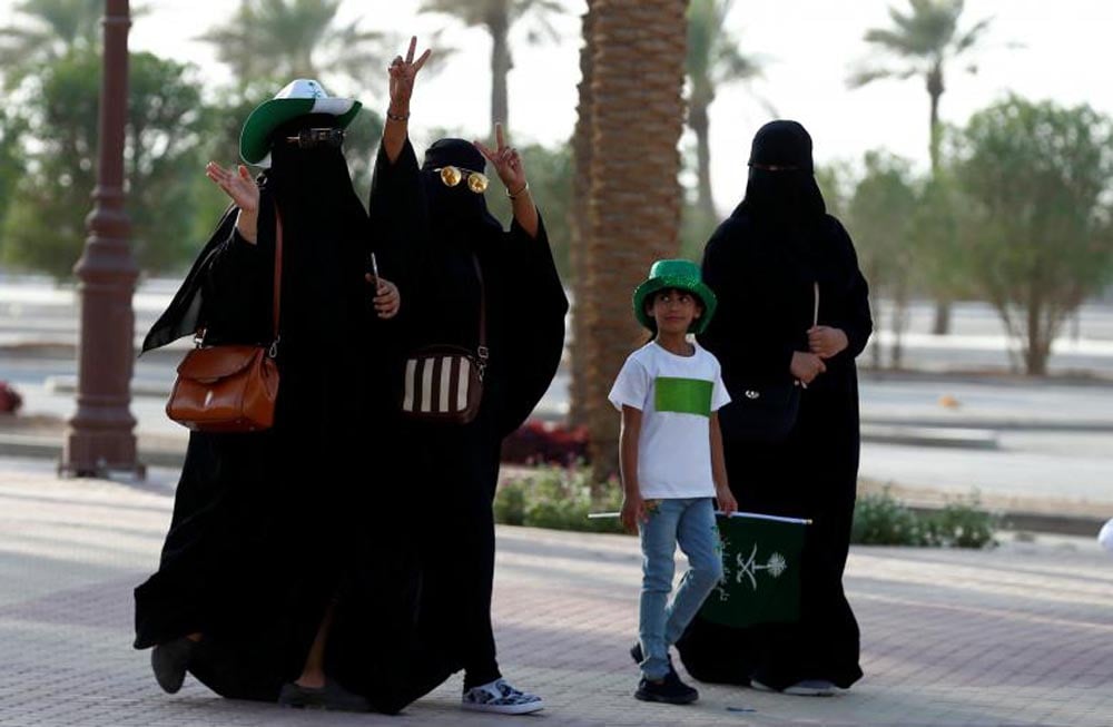 Women arrive to a rally to celebrate the 87th annual National Day of Saudi Arabia in Riyadh, September 23, 2017. REUTERS