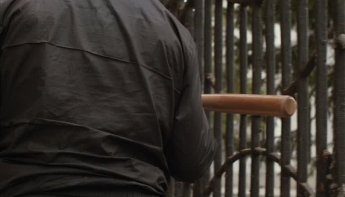 Injured by bullets, New York father-son duo beat alleged gunman with a bat