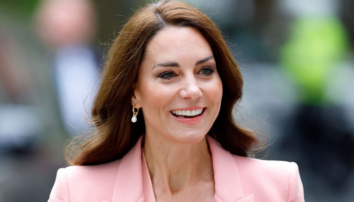 Kate Middleton joins 'wellbeing' walk amid stormy UK weather