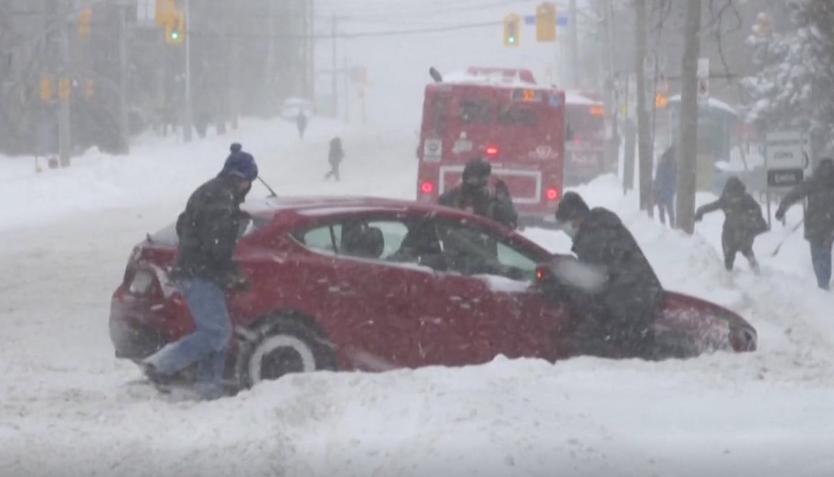 Toronto cleanup begins after record snowfall hits Ontario