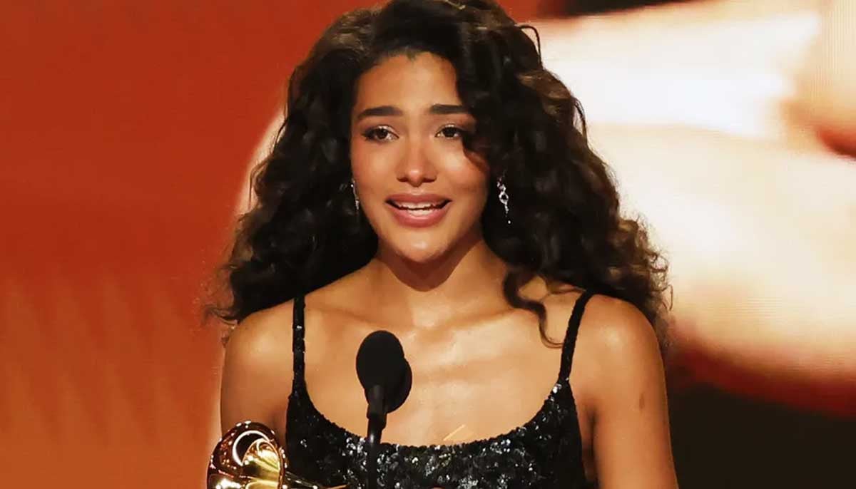 Olivia Dean fights back tears after winning first Grammy Award