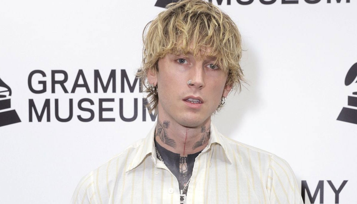 Machine Gun Kelly unveils new ear ink at Grammys pre-party