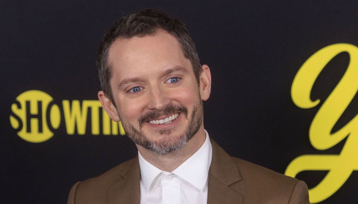 Elijah Wood reflects on playing 'adult' as a kid in Paula Abdul music video