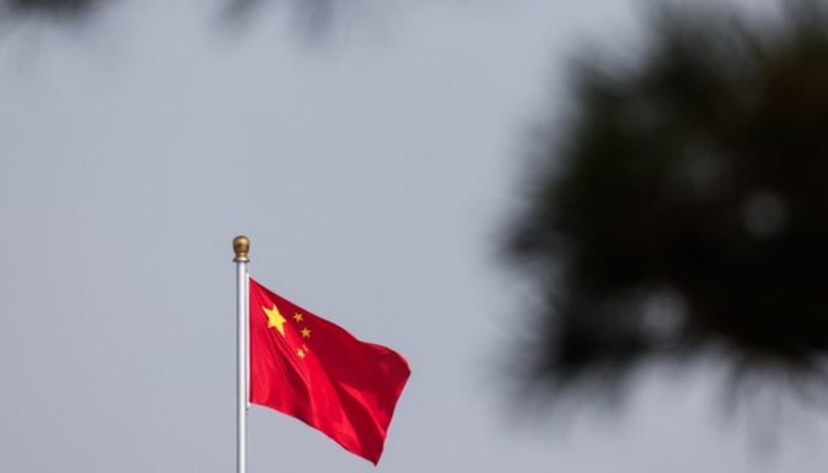 China tightens rules on overseas investment as tech rivalry with US intensifies