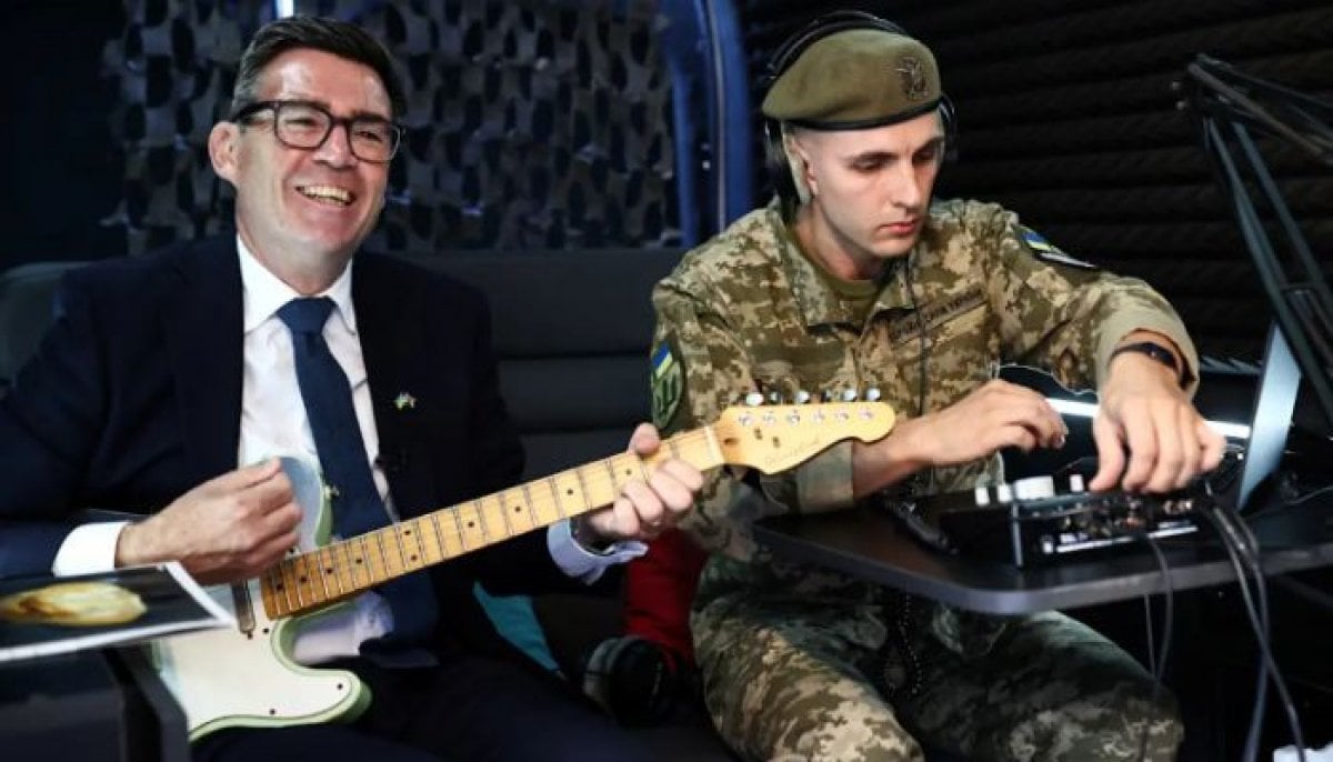 Andy Burnham's 'Rusholme Ruffians' jam with Ukrainian soldiers in Kyiv goes viral 