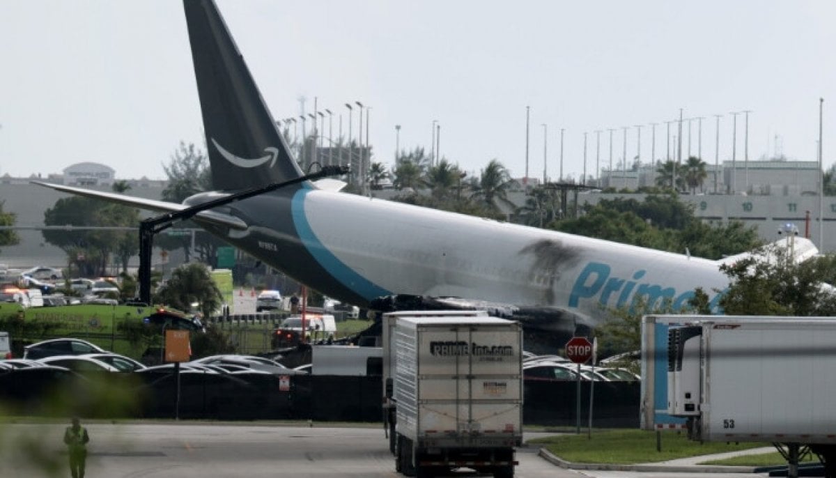 Miami airport crash: five victims killed were in a cleaning van and SUV, NTSB says