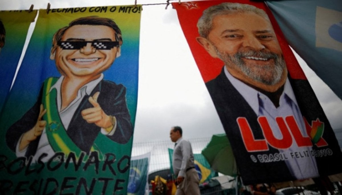 Brazil votes in tight race between Bolsonaro and Lula as polls close
