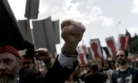 Greeks mark May Day with strike, demos