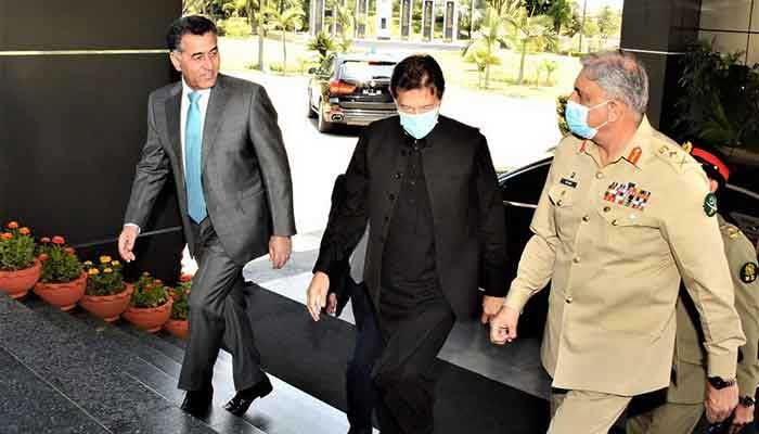Prime Minister Imran Khan arrives at the ISI Headquarters for a briefing with COAS General Qamar Bajwa and DG ISI Lieutenant General Faiz Hameed. File photo.