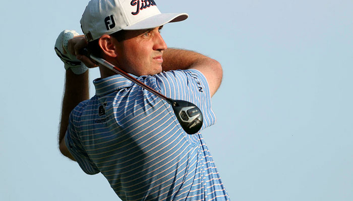 Poston clings to lead but Hahn steals show with 60