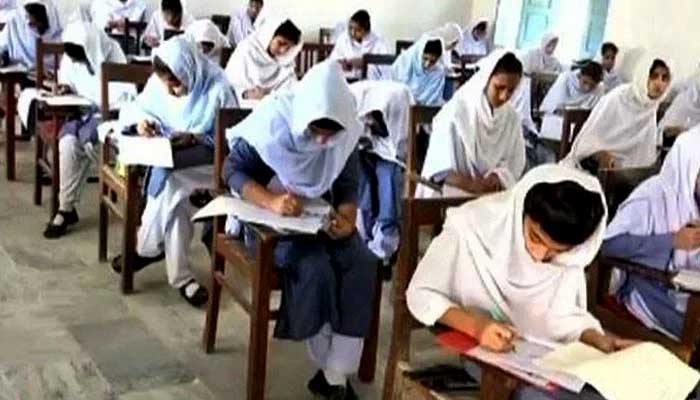 Students giving exam. File photo
