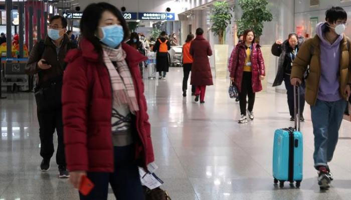 China restricts overseas travel; Macau orders virus testing after first cases in months