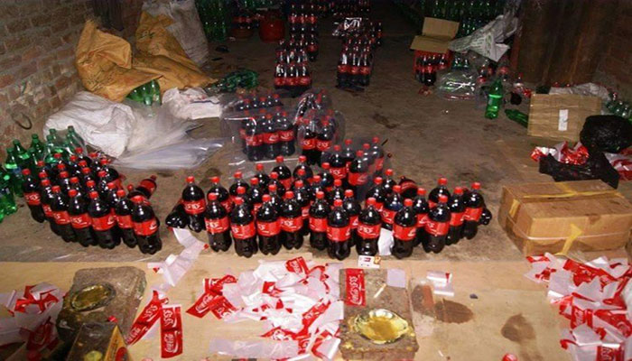 Factory preparing counterfeit drinks sealed