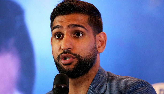 Boxer Amir Khan removed from US flight