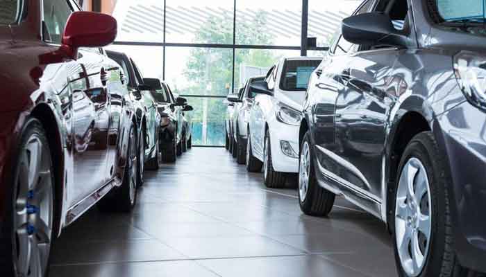 Cars parked at a showroom. File photo