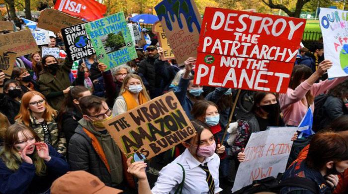 Thousands rally in rainy Glasgow for COP26 climate action