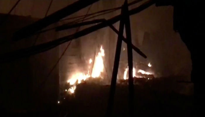 Fires destroy house, six warehouses