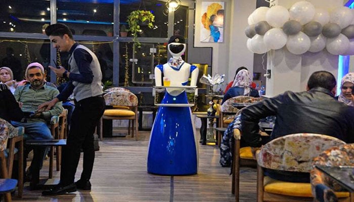 Robot waiters take Iraq’s Mosulites back to the future