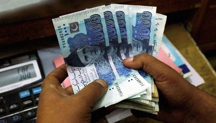 Rupee inches up