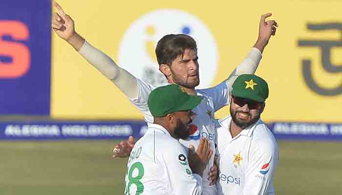 Pakistan´s Shaheen Shah Afridi (C) celebrates with teammates after the dismissal of Bangladesh´s Najmul Hossain Shanto during the third day of the first Test cricket match between Bangladesh and Pakistan at the Zahur Ahmed Chowdhury Stadium in Chittagong on November 28, 2021.-AFP