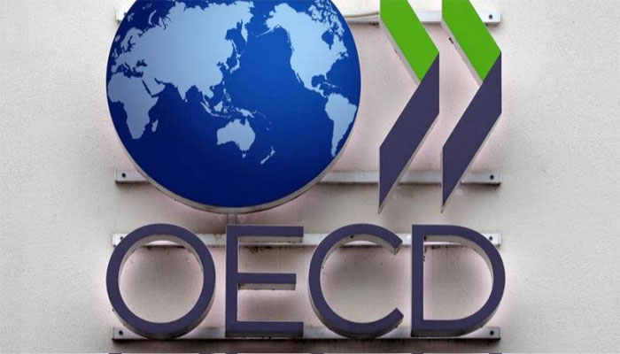 OECD cuts world growth forecast, warns of Omicron threat