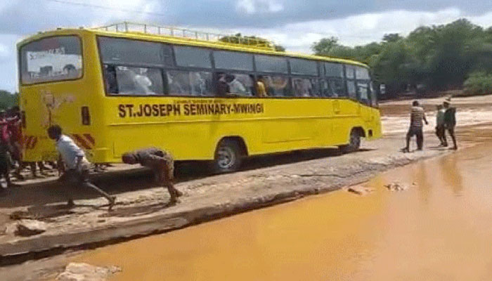 Over 20 drown as bus swept into flooded river in Kenya