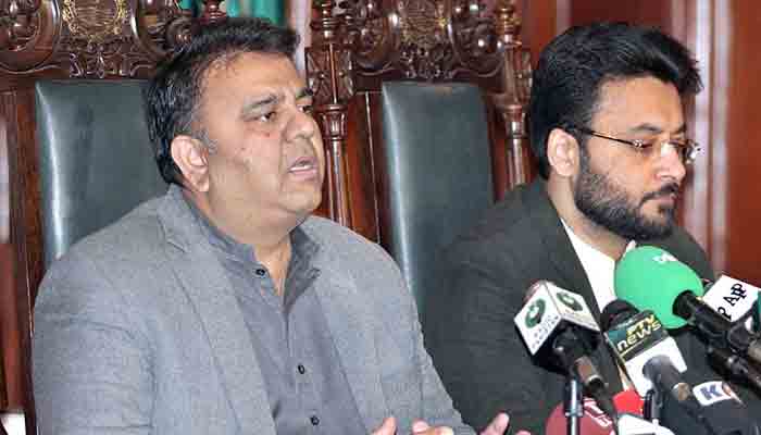 Federal Minister for Information and Broadcasting Chaudhry Fawad Hussain and Minister of State for Information Farrukh Habib jointly addressing a press conference at Governor House. -APP