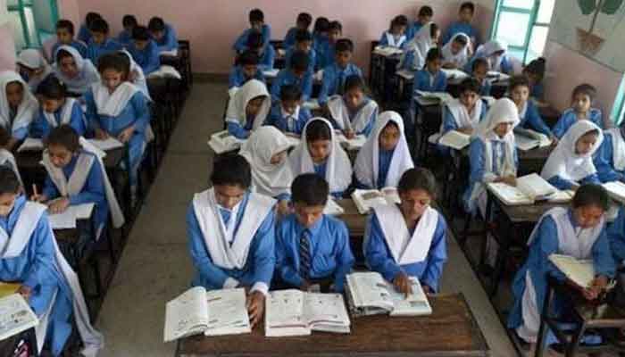 Schoolchildren studying in a classroom. File photo