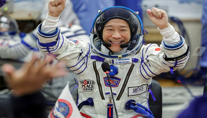 Japanese space tourists return to Earth after 12 days