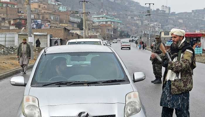 Suicide bomber shot dead as Taliban fighters gather for passports