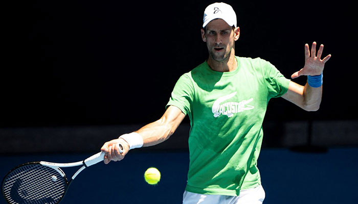 Djokovic drawn to play Australian Open as deportation threat looms