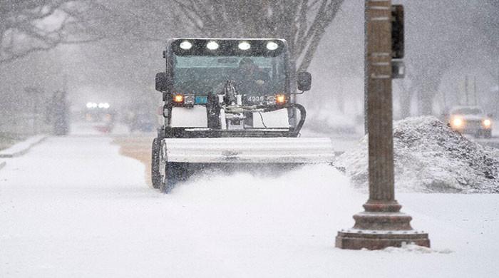 Travel woes as winter storm blankets eastern US and Canada