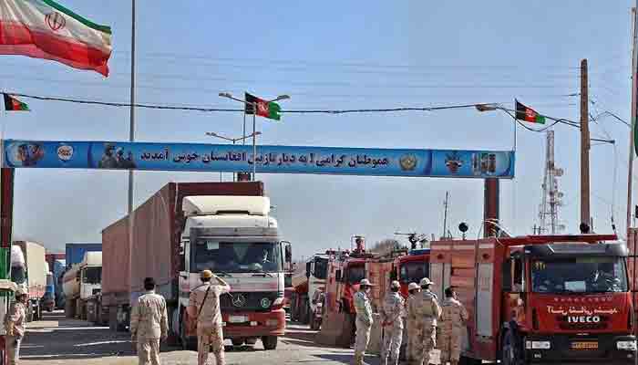 Trade convoy crossing Afghan-Iran border. -File