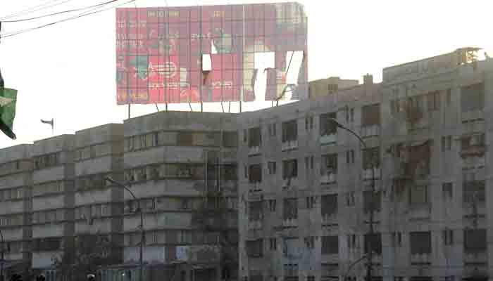 A view of damaged billboard due to heavy dust storm that hit Karachi on January 21. -ONLINE