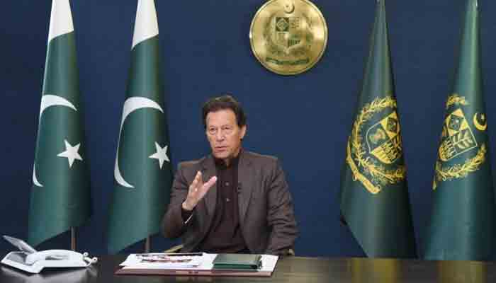 Prime Minister Imran Khan answers questions from the general public on live television. — PID