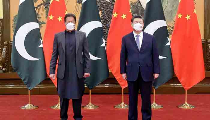 Prime Minister Imran Khan with Chinese President Xi Jinping before a meeting along with his delegation.  -APP