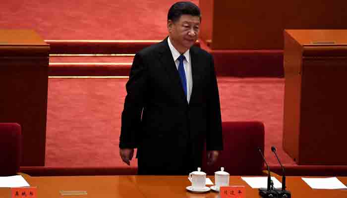Chinese President Xi Jinping attends the commemoration of the 110th anniversary of the Xinhai Revolution which overthrew the Qing Dynasty and led to the founding of the Republic of China, at the Great Hall of the People in Beijing on October 9, 2021.-AFP