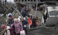 Panic-stricken Ukrainians flee Kyiv