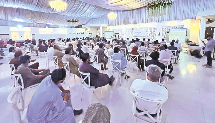 The public hearing of the Sindh Environmental Protection Agency is underway at a banquet in Karachi, on March 9, 2022. — Photo by author