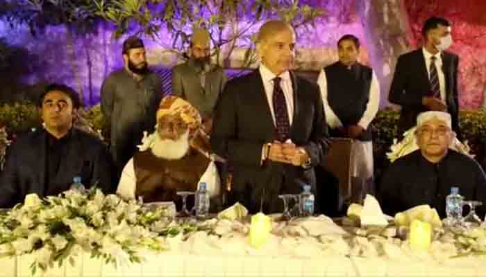 PML-N President Shahbaz Sharif speaking to Opposition leaders at a dinner hosted by him in Islamabad. -Screengrab