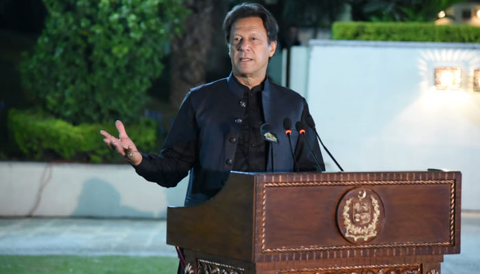 Prime Minister Imran Khan addressing a gathering of government parliamentarians in Islamabad on April 2, 2022. - PID