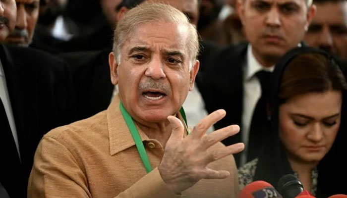 Pakistan opposition leader Shehbaz Sharif speaks to the media outside the Supreme Court in Islamabad on April 5, 2022. AFP