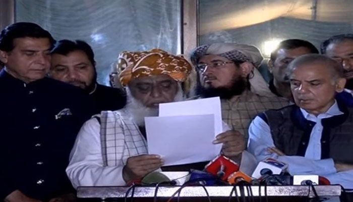 Fazlur Rehman reading out communique after the meeting of the joint opposition on April 6, 2022. - Screengrab of a local TV.