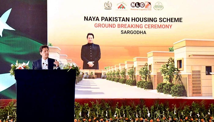 Former prime minister Imran Khan addresses the ground-breaking ceremony of the Naya Pakistan Housing Scheme. -APP/file