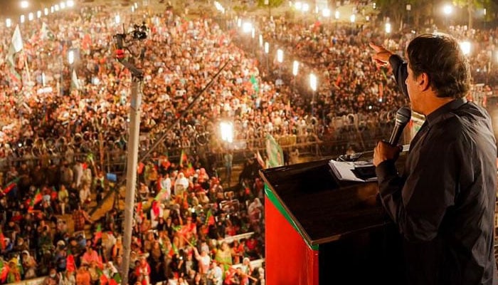Imran Khan addressing a public rally in Jhelum on  May 10, 2022. Photo: Twitter/ImranKhanPTI